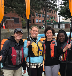 Olmsted Scholars and event attendees prepare to kayak at an LAF Olmsted Scholar bioregional event