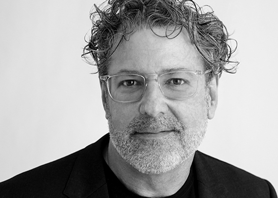 Black and white headshot of Shane Coen