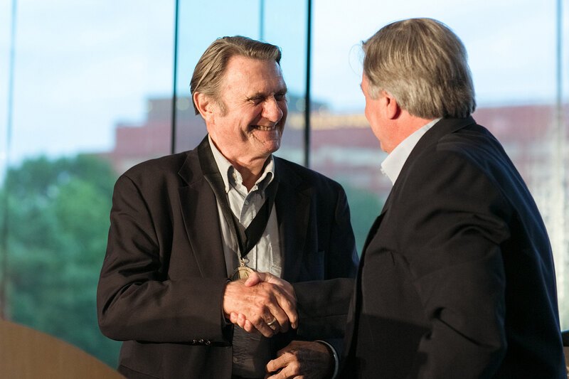 Grant Jones receives the first LAF Medal from Awards Commitee Chair Dennis Carmichael.