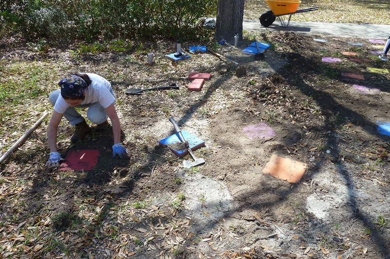 Nathania Martinez works in a reading garden