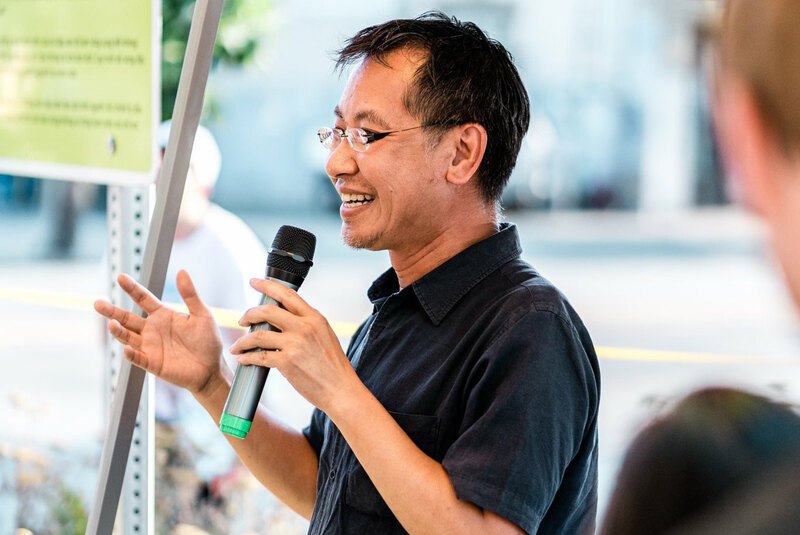 Jeff Hou speaks into a microphone