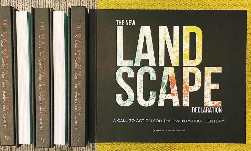A stack of the New Landscape Declaration books, showing the cover and spine
