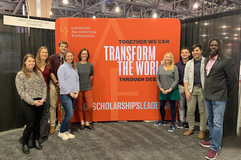 LAF staff, Board Member Rebecca Bradley, and Board Emeritus Kona Gray pose in front of the LAF booth at ASLA 2018