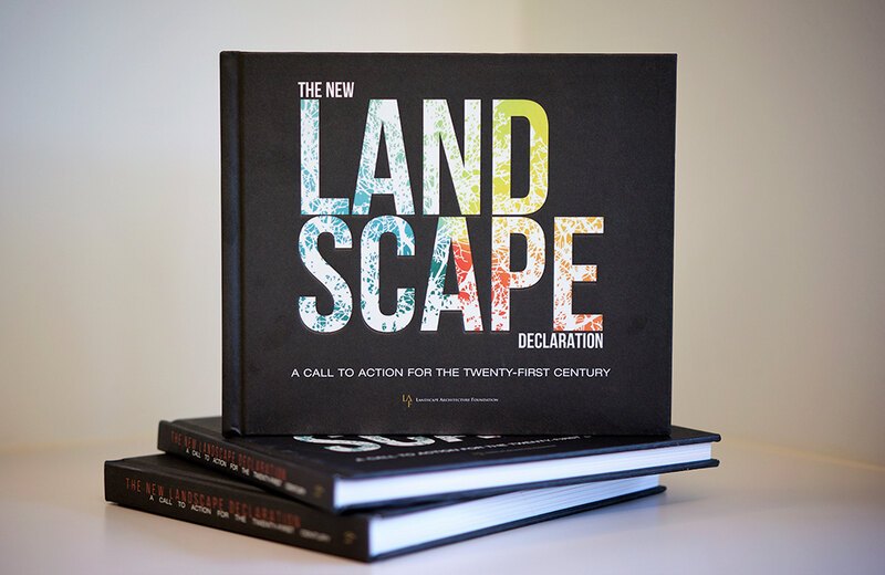 The New Landscape Declaration book with cover displayed on a stack of two
