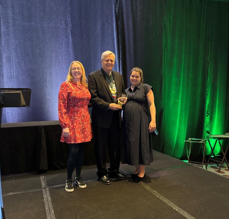 LAF staff present award to Ken Brooks