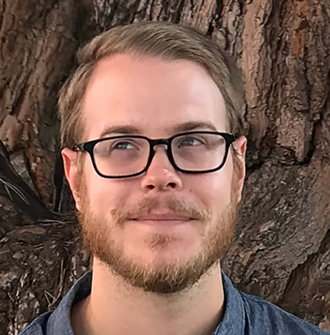 Headshot of William Thomas