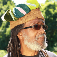 Headshot photo of Malik Yakini