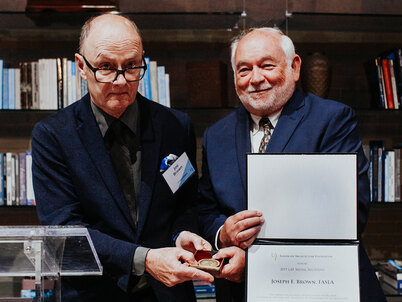 Joe Brown receives the 2019 LAF Medal from Awards Committee Chair Len Hopper