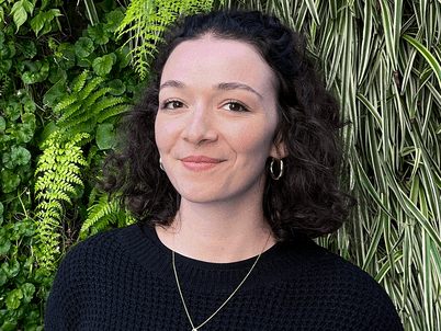 Delphine smiles