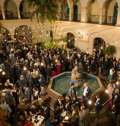 Guests around the courtyard fountain at LAF's 34th Annual Benefit