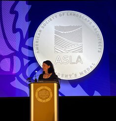 LAF CEO Barbara Deutsch on stage receiving the ASLA President's Medal